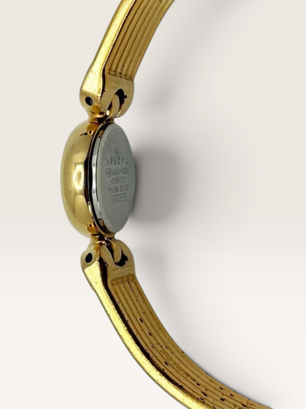 Vintage SEIKO Gold-Tone Bangle Watch 1E20-0380