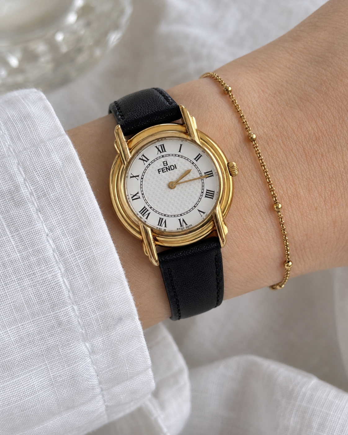 Vintage FENDI Gold-Tone Watch with Black Leather Strap