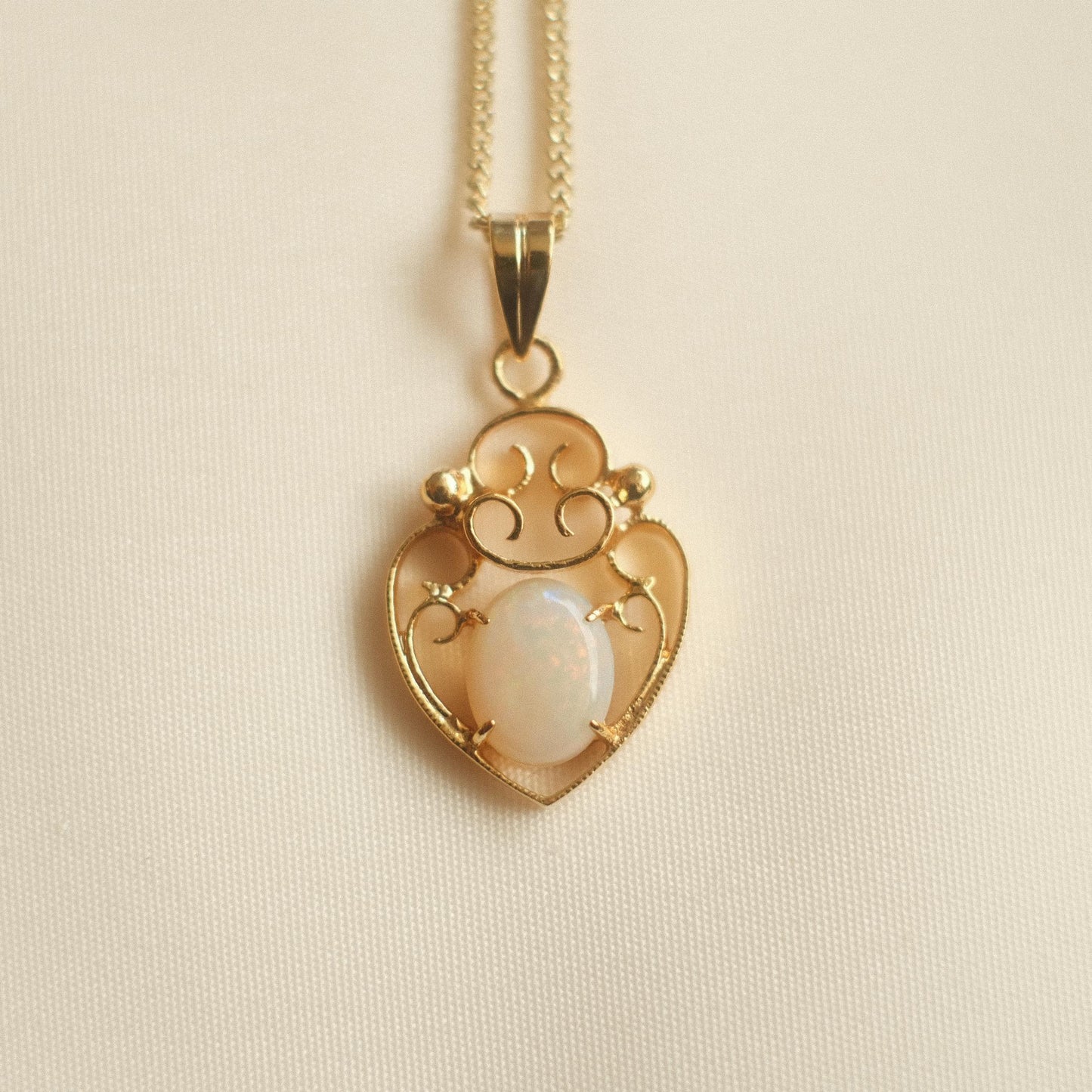 "Ethereal Glow" White Opal Heart Motif Pendant