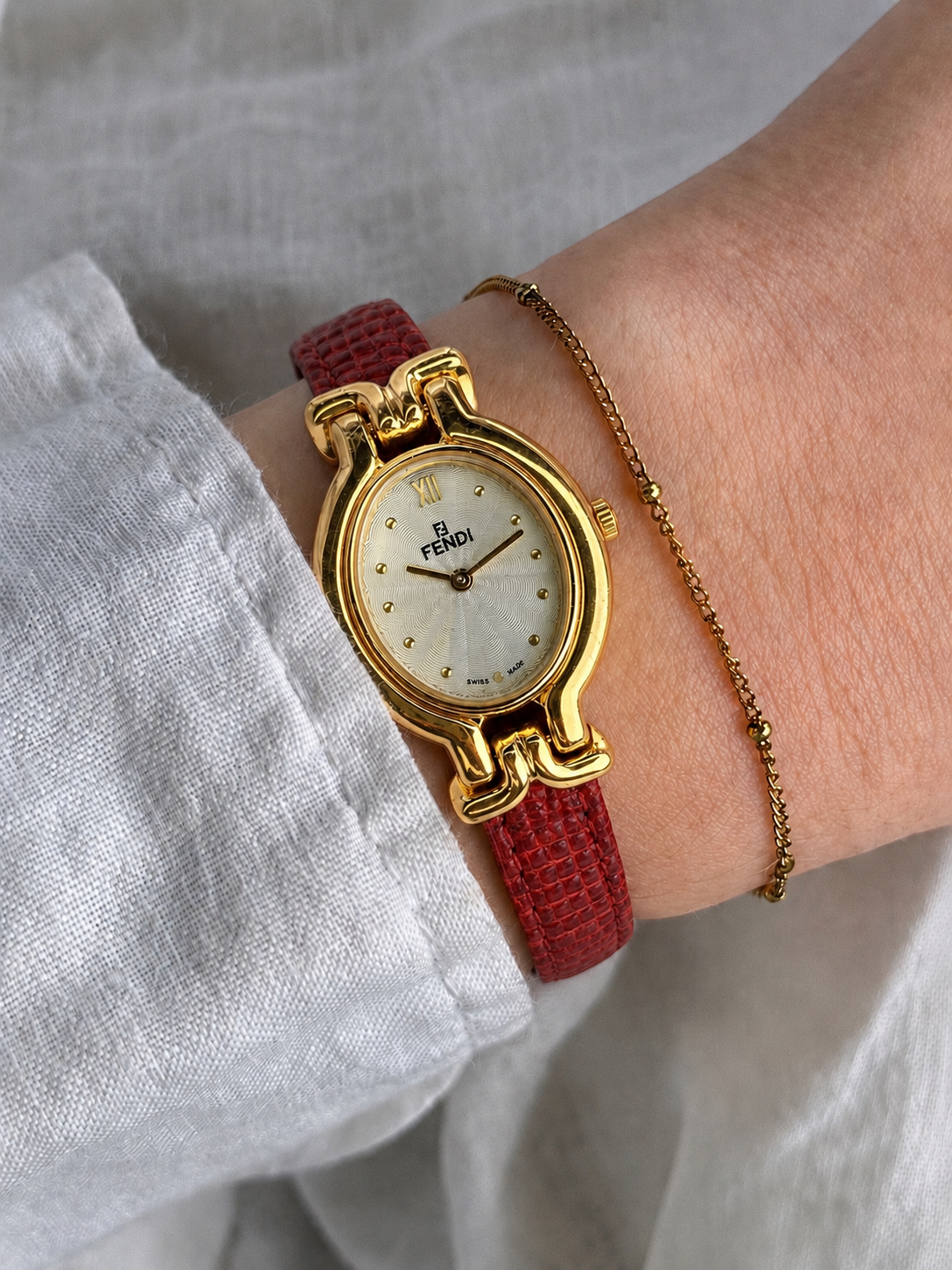 FENDI 640L Gold-Tone Guilloché Dial Red Strap Watch