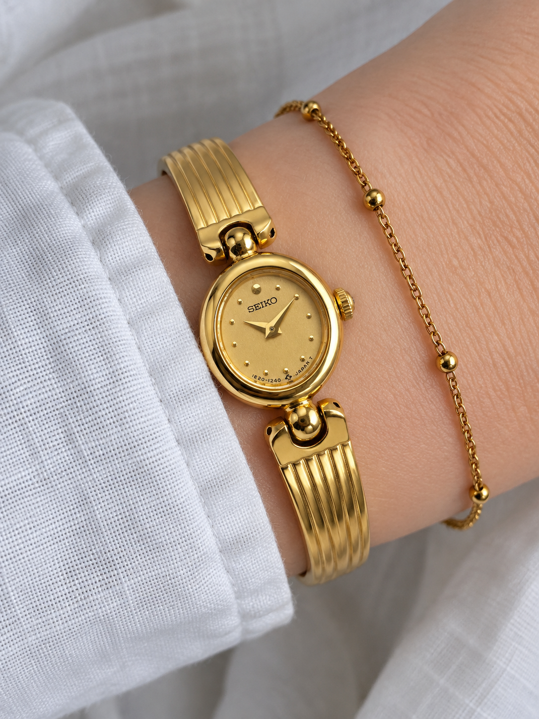 Vintage SEIKO Gold-Tone Bangle Watch 1E20-0380